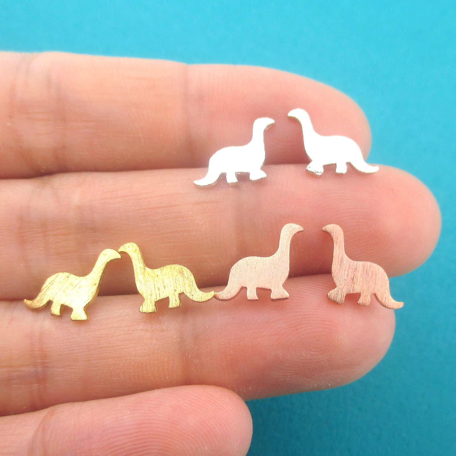 Baby Apatosaurus Shaped Prehistoric Stud Earrings in Gold Silver or Rose Gold — shop and try on with AI characters