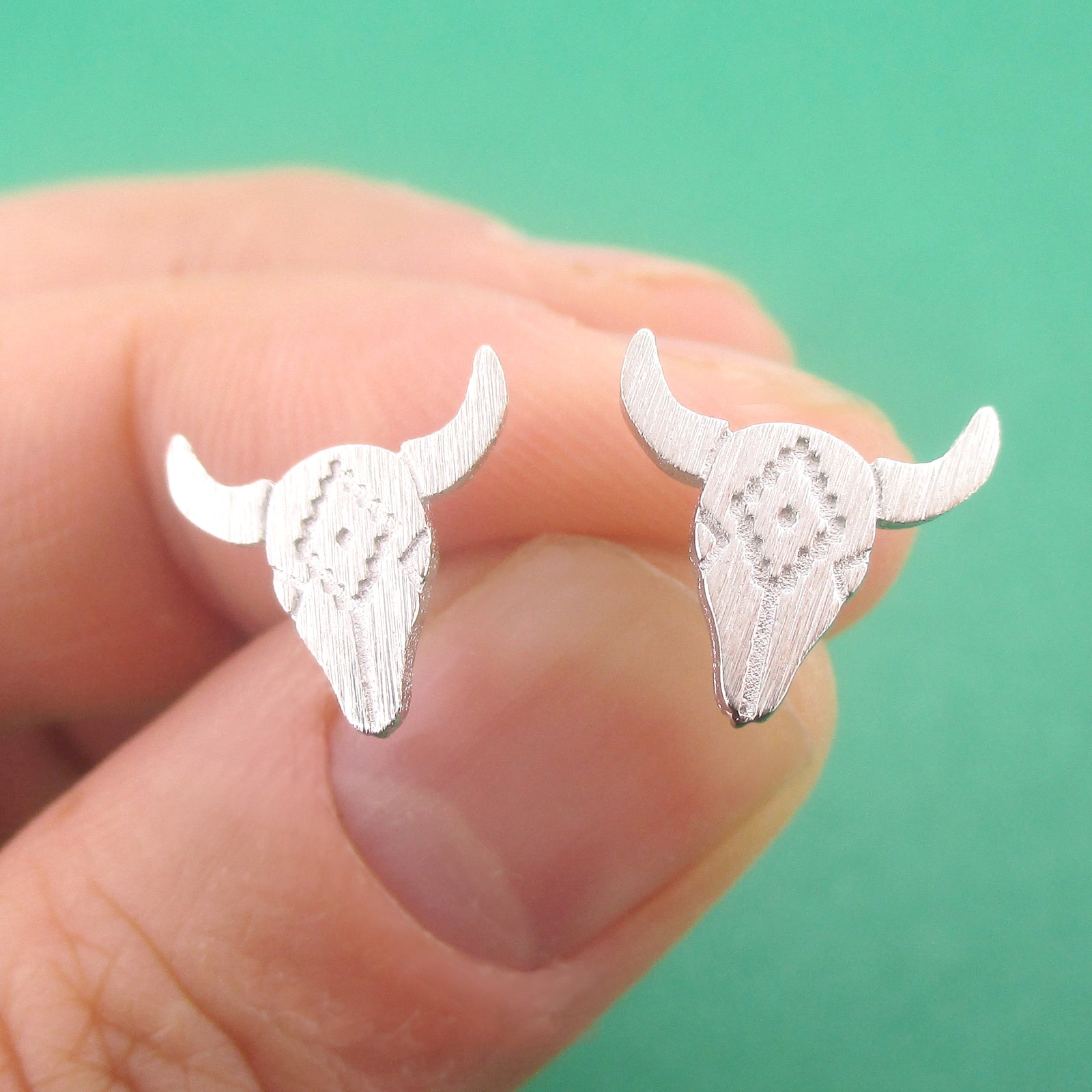 Western Southwest Steer Bull Cow Skull with Tribal Pattern Stud Earrings — shop and try on with AI characters
