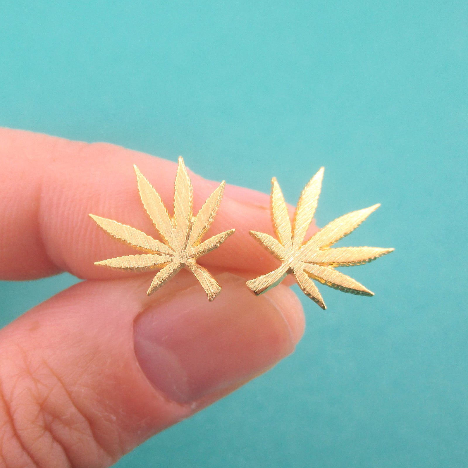 Cannabis Weed Sativa Marijuana Pot Leaf Stud Earrings in Silver Gold or Rose Gold — shop and try on with AI characters